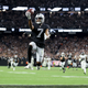 Zay Jones #7 of the Las Vegas Raiders celebrates after scoring the game-winning touchdown in overtime to defeat the Baltimore Ravens 33-27 at Allegiant Stadium on September 13, 2021 in Las Vegas, Nevada.